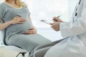 Симптомы при беременности: что делать?